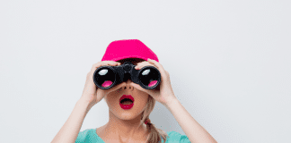 Woman looking through binoculars