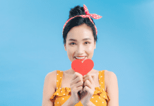 Woman holding a red heart