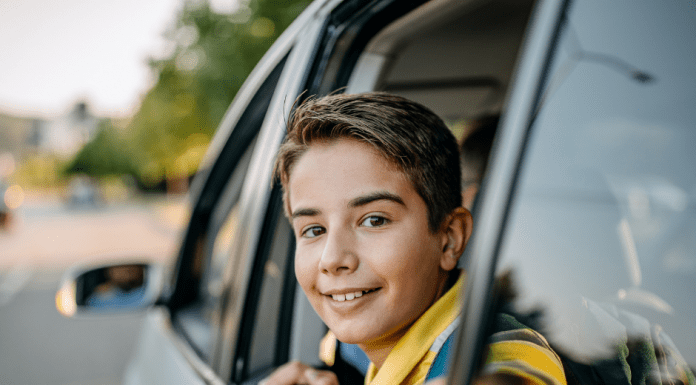 Boy riding in a car