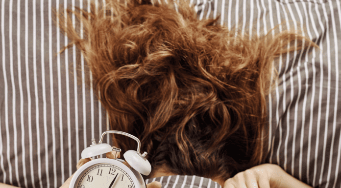 Woman struggling to sleep