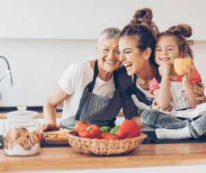 grandma, mom and daughter in kitchen