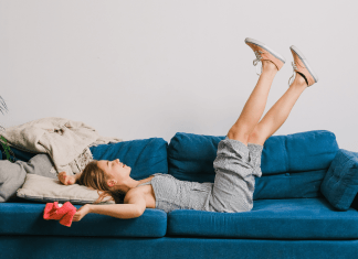 Woman laying on couch