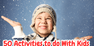 little boy in warm clothes enjoy snow