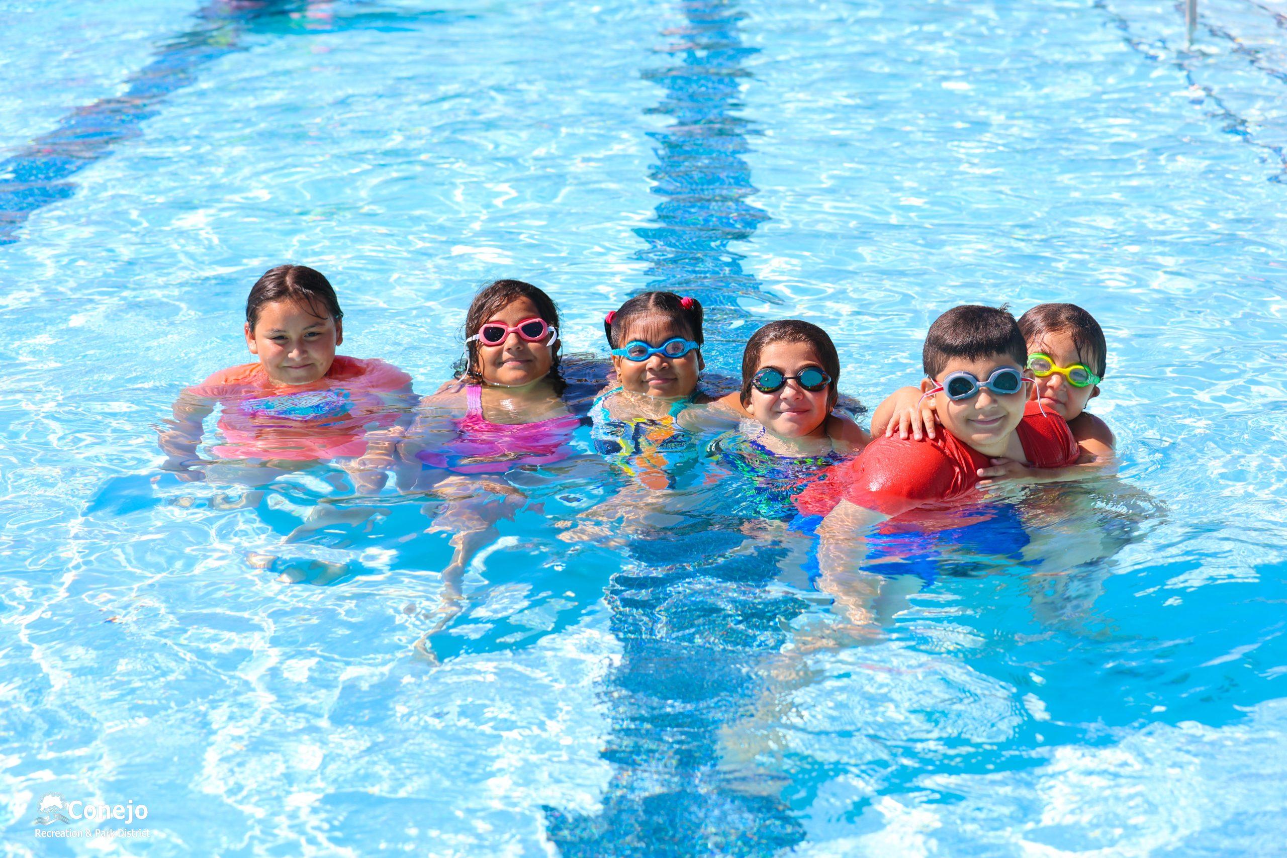 Children in swimming pool.