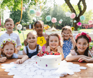 Children at a birthday party in a garden