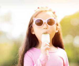 child eating a healthy summer treat