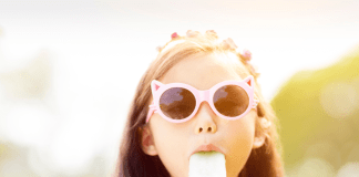 child eating a healthy summer treat