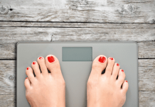 woman's feet on a scale