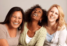 Diverse group of women laughing together